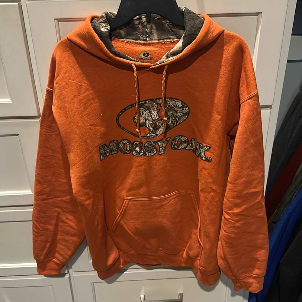 Mossy Oak hooded orange/camo sweatshirt.  Men’s Size M